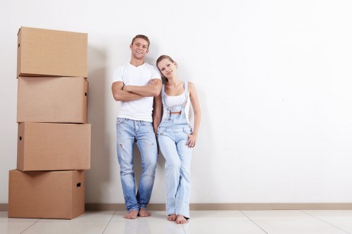Professional flat removals in Streatham with movers handling boxes