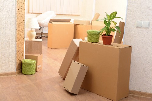 Packed boxes and furniture loaded into a removal van