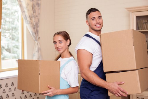 Packing furniture securely into a moving truck in Streatham